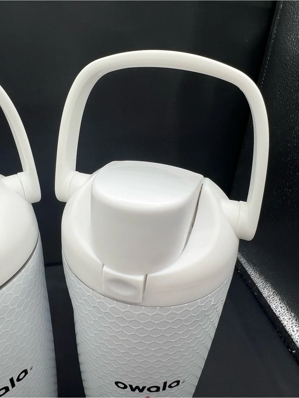 Owala White Insulated Travel Bottle with Textured Grip and Carry Handle For Golf